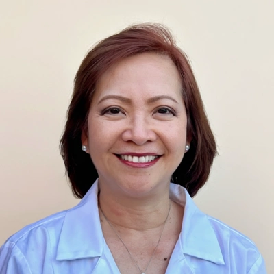 Dr. Maria Magdalena Ligad smiling at camera